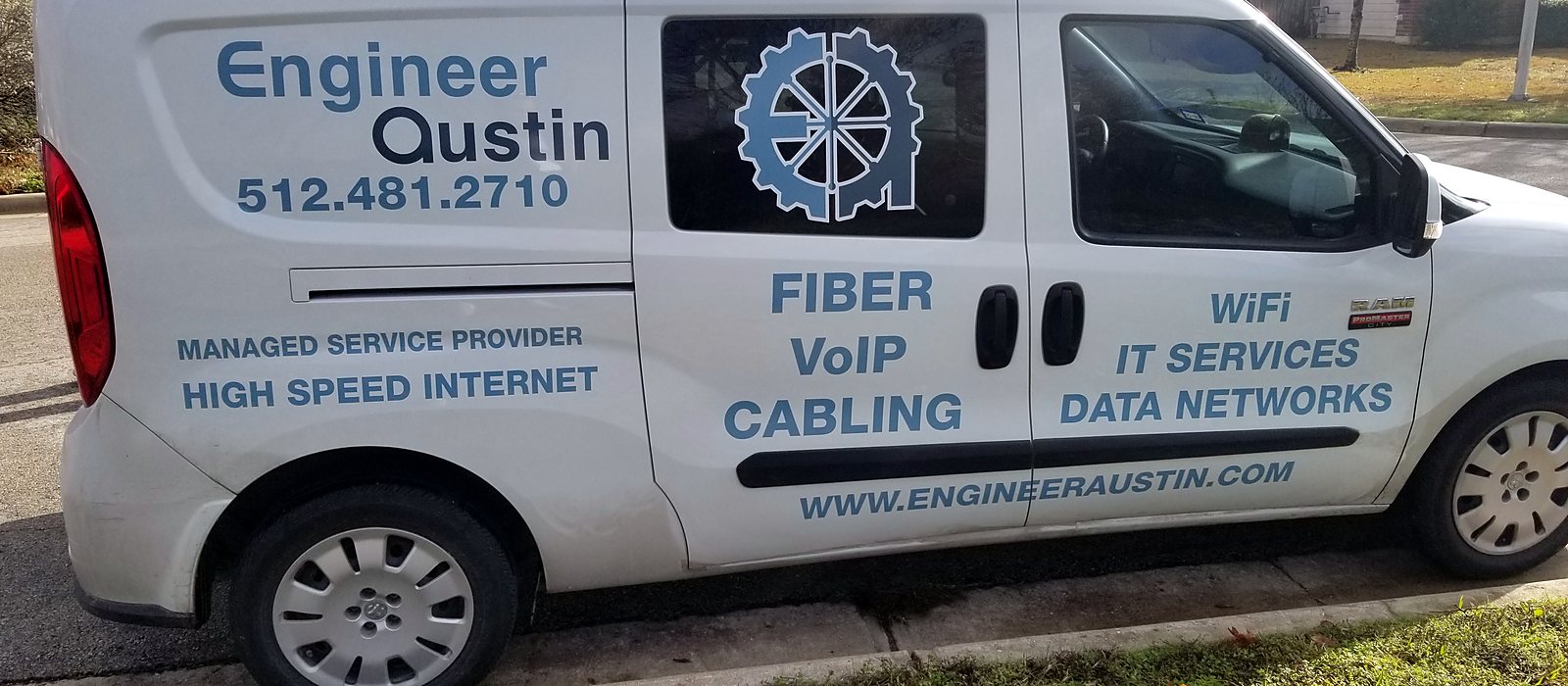 Engineer Austin service van lettered for fiber, VoIP, cabling, Wi-Fi, IT services and data networks
